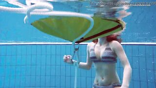 Huge jugs 18 yo Liza Bubarek swimming nude inside the pool