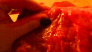 Rubbing the pig like he is a piece of meat