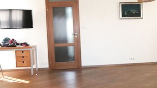 Natasha walks inside white heels on widescreen