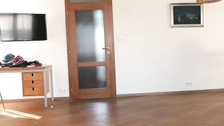 Natasha walks inside white heels on widescreen