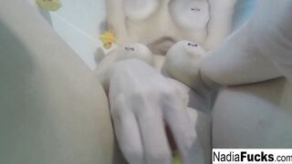 Nadia takes a hot tub with some pvc duckies