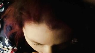 Ginger blows cock and takes cum into her mouth inside