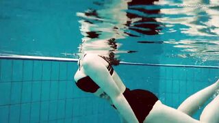 Huge hooters dark hair sexy Dashka swimming underwater