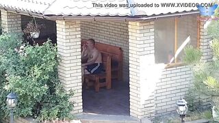 While her daddy is smoking inside the yard she is
