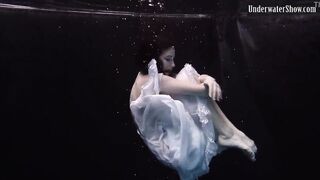 Aqua women Andrejka underwater stripping and swimming