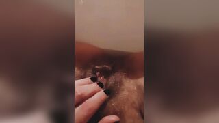 Hot cougar with huge clitoris having fun with bushy bush