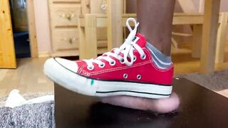 Ball crush with red Converse Chucks