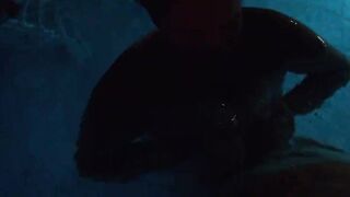 Titty fucking husband inside the pool