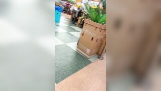 Hispanic Teenie candid booty at grocery store.