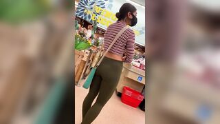 Hispanic Teenie candid booty at grocery store.