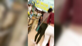 Hispanic Teenie candid booty at grocery store.