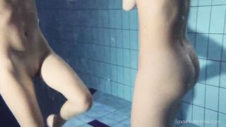 Blonde and dark haired Duna and Nastya underwater cuties