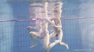 Blonde and dark haired Duna and Nastya underwater cuties