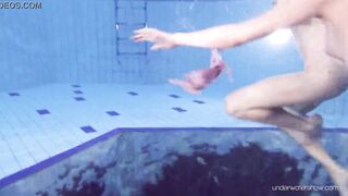 Blonde and dark haired Duna and Nastya underwater cuties
