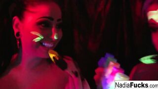Ebony-light babes Nadia White and Ophelia suck off a colorful