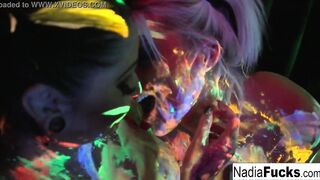 Ebony-light babes Nadia White and Ophelia suck off a colorful