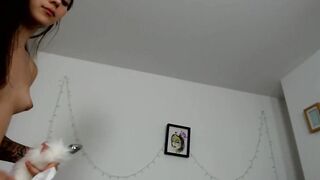 Adorable face skinny fucking her sweet butt with a tail buttplug
