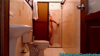 Female Bodybuilder taking a shower