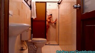 Female Bodybuilder taking a shower