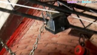 Uniformed dominas pegging and spanking sissy barmens butt
