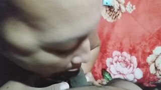 My comadre slides it into his mouth and plays with