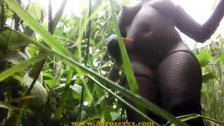 native Ebony vibrator masturbating into the jungle