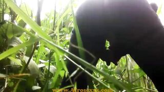 native Ebony vibrator masturbating into the jungle