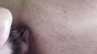 licking her clitoris with tongue flicking her bean