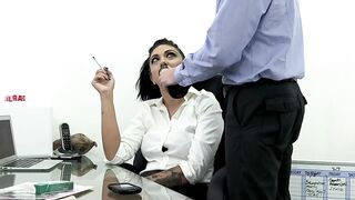 The secretary first fucks a long pvc sex toy and then