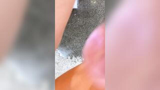 Woman masturbates into various outdoor places and squirts