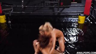 Oily wrestling makes them extra soak! They have anal sex