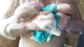 Washing bouncing DD mommy titted inside the shower into slow motion