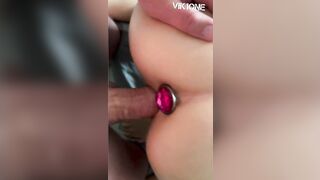 goddess bitch stands doggy style with a booty plug inside the booty