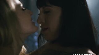 Lesbo blonde licks the inked vagina of a big boobed dark haired