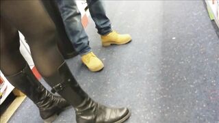 Adorable Beauty into african tights, mini skirt and boots