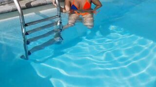 Young women masturbates into the institute pool.