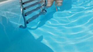 Young women masturbates into the institute pool.