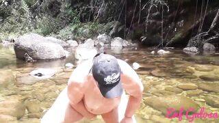 having fun nude inside the waterfall