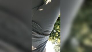 Shawna peeing into outdoors first time