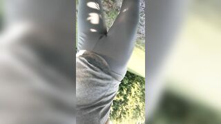 Shawna peeing into outdoors first time