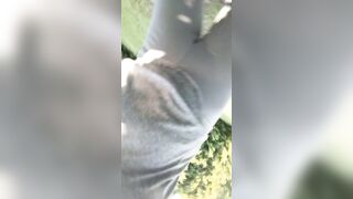 Shawna peeing into outdoors first time
