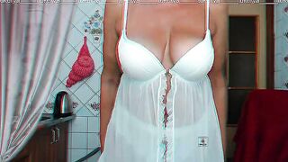 Lukerya into the kitchen into transparent white linen