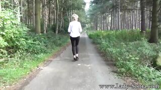Lady Sonia flashing then masturbates into the forest