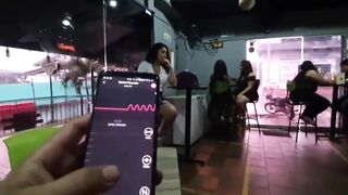 Martinasmith squirt over the waiter's shoes at the bar