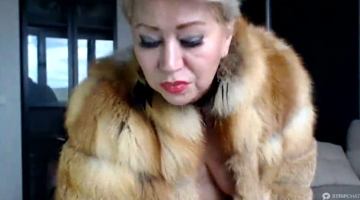 Love4Porn.com Presents Older Russian web cam whore AimeeParadise inside a fur  coat sucks