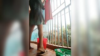 Wairimu-Esther--- walking at the balcony with pussyflashing