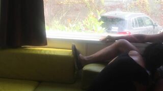 Fiance giving risky fellatio into front of window into a camping