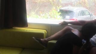 Fiance giving risky fellatio into front of window into a camping