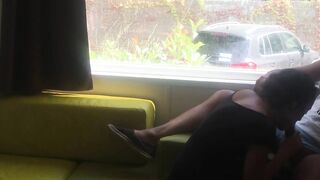Fiance giving risky fellatio into front of window into a camping