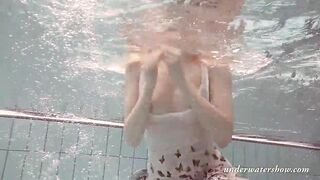 Blonde Bae Okuneva bald twat underwater swimming